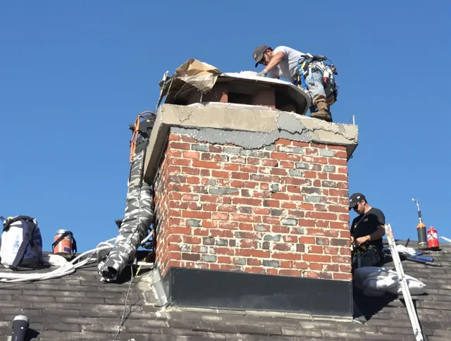 Norco Chimney Sweep installing a custom chimney crown in Norco, CA