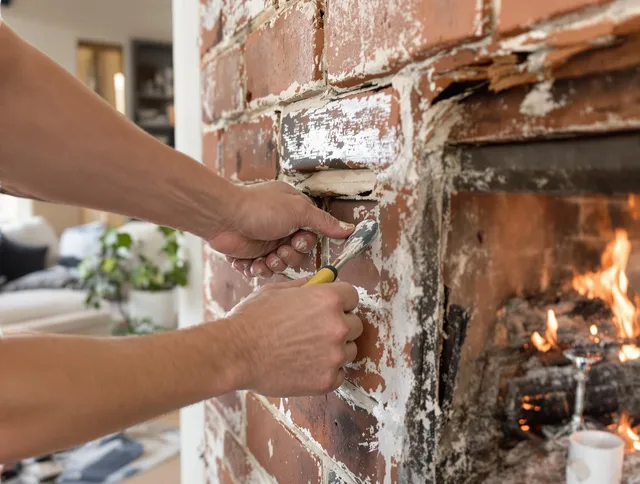 Routine fireplace repair by Norco Chimney Sweep in Norco, CA